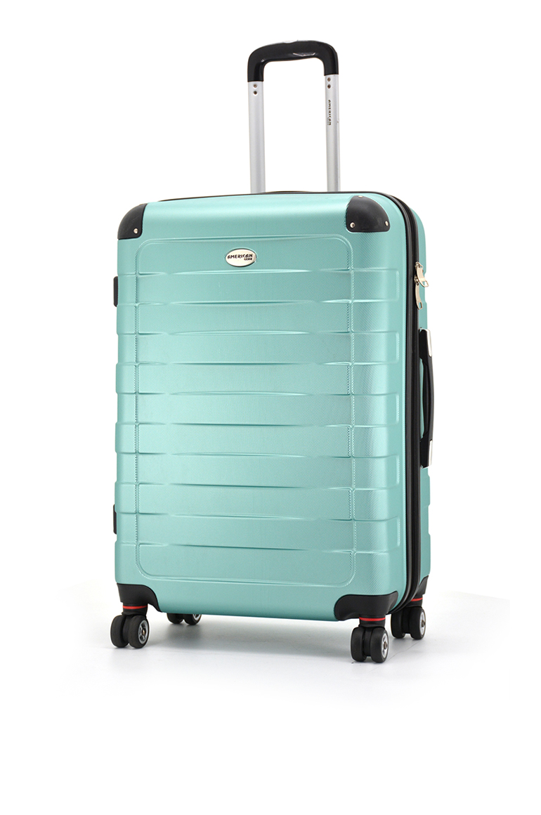 Hard shell suitcase with textured shell panel